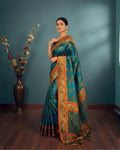 Vamika Teal Handcrafted Silk Saree